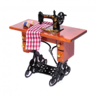 DF409 - Sewing Machine and Accessories on Table
